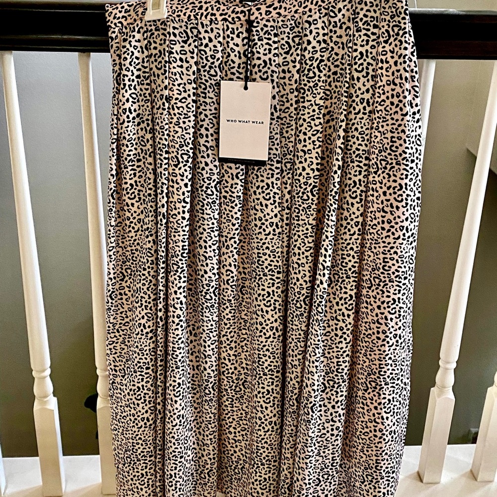 Long light pink leopard skirt size 6.